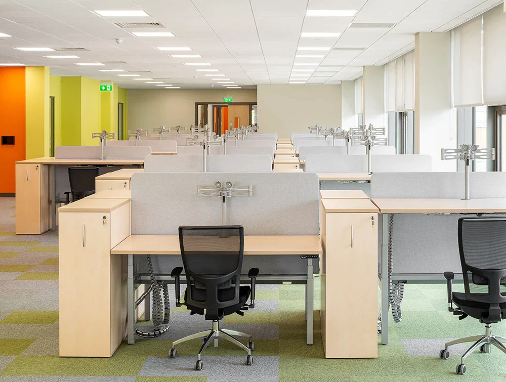 Leap-Adjustable-Desks-with-Acoustic-Desk-Dividers-Ergonomic-Monitor-Arms-and-OZ-Mesh-Office-Chairs