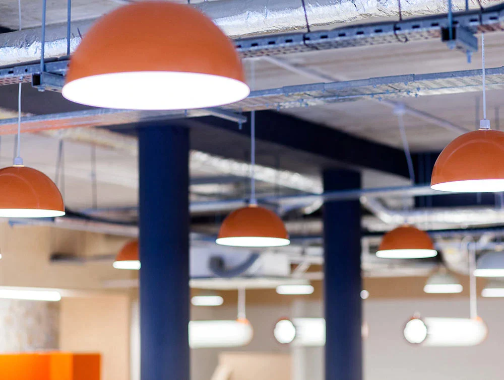 Orange-light-fittings-with-blue-supports