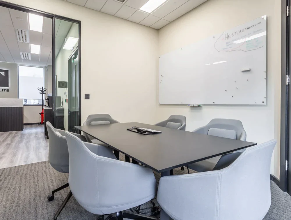 Twinlite-Office-Black-Meeting-Room-Table-with-Grey-Tub-Chairs